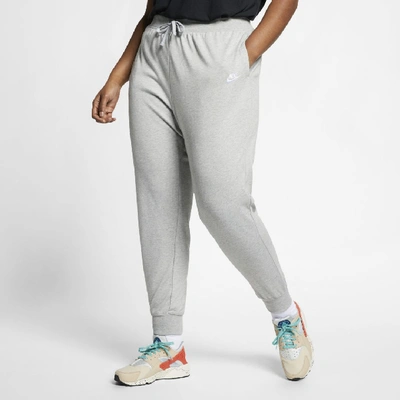 Shop Nike Sportswear Women's Jersey Pants (plus Size) In Grey