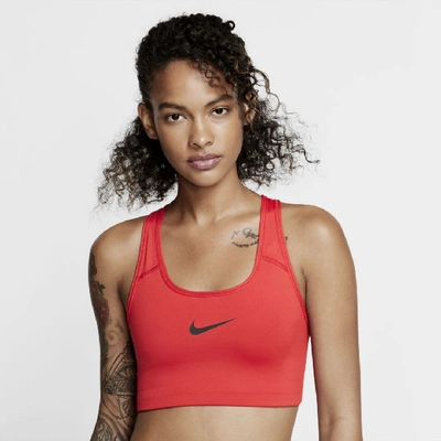 Shop Nike Swoosh Women's Medium Support Sports Bra In University Red