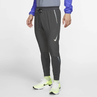 Shop Nike Swift Men's Running Pants In Dark Smoke Grey