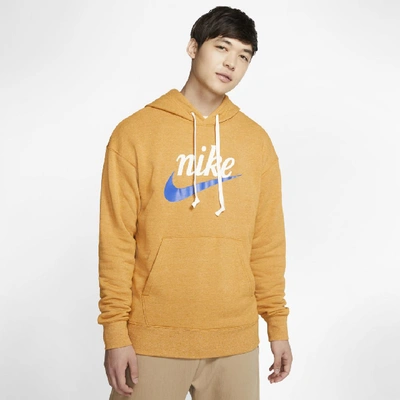 Shop Nike Sportswear Heritage Men's Graphic Pullover Hoodie In Gold