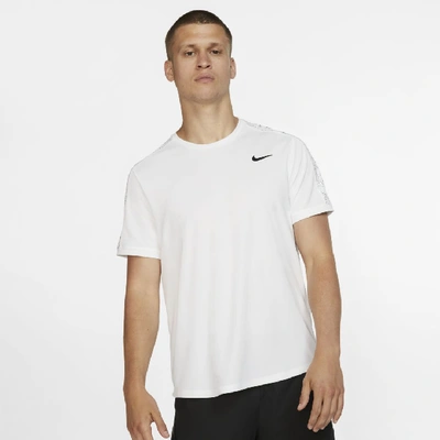 Shop Nike Court Dri-fit Men's Short-sleeve Graphic Tennis Top In White