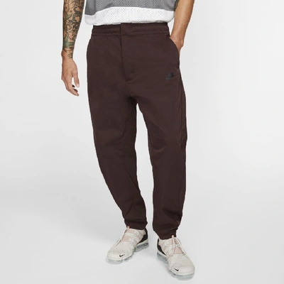 Shop Nike Sportswear Men's Woven Pants In Mahogany/black