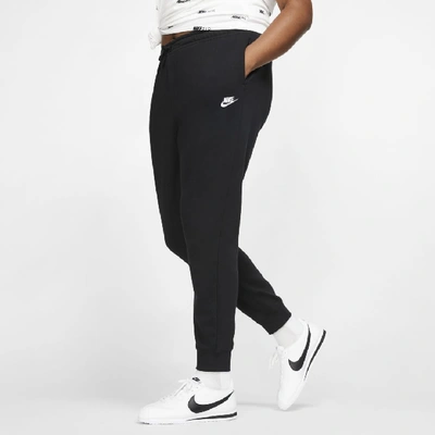 Shop Nike Women's  Sportswear Essential Fleece Pants (plus Size) In Black