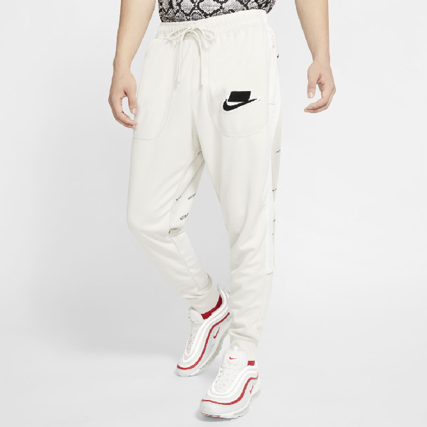 nike cream track pants