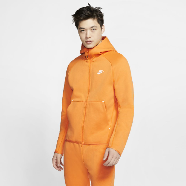 orange nike tech