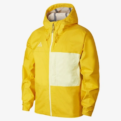 Shop Nike Acg Packable Rain Jacket In Gold