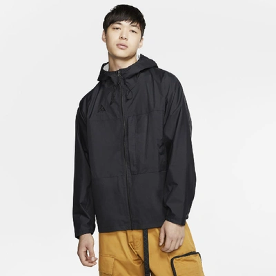 Shop Nike Acg Packable Rain Jacket In Black