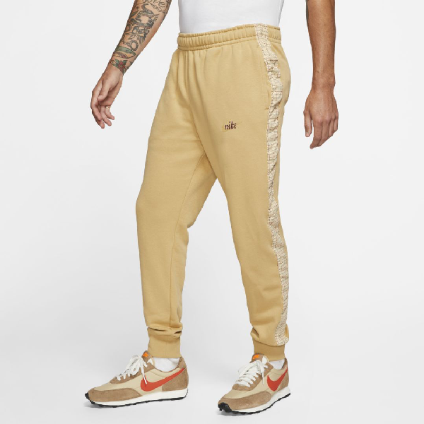 gold nike joggers