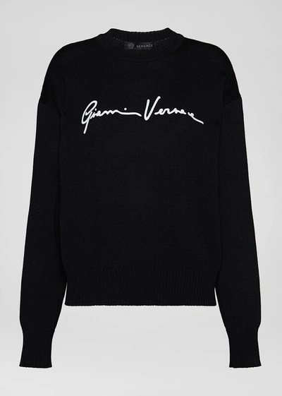 Shop Versace Embroidered Gv Signature Sweater In Black