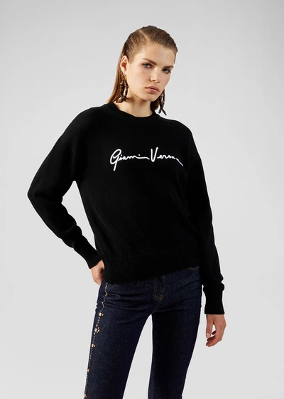 Shop Versace Embroidered Gv Signature Sweater In Black