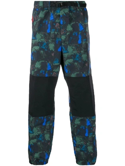 Shop Nike Abstract Print Trousers In Black