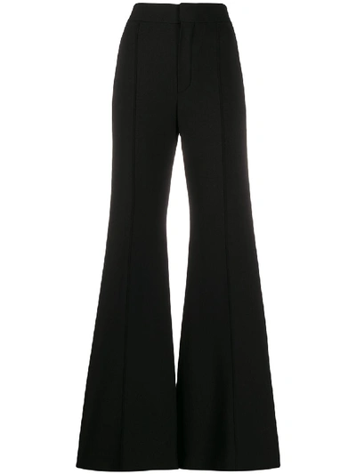 Shop Chloé High-rise Flared Trousers In Black