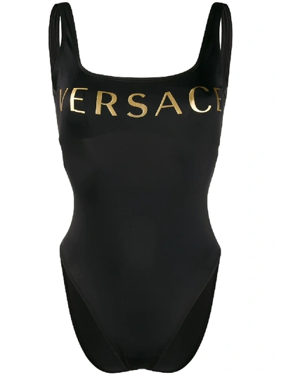 Shop Versace Logo Print Swimsuit In 黑色