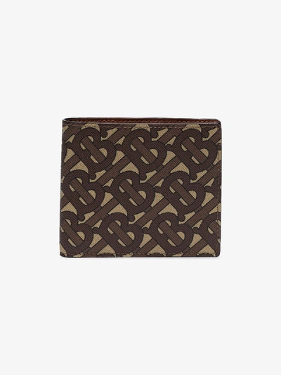 Shop Burberry Monogram Print Bifold Wallet In Brown