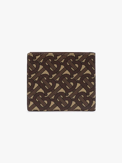 Shop Burberry Monogram Print Bifold Wallet In Brown