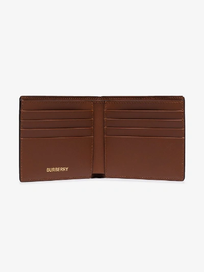 Shop Burberry Monogram Print Bifold Wallet In Brown