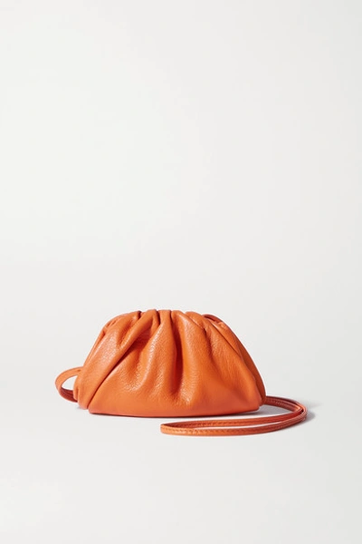 Shop Bottega Veneta The Pouch Mini Leather Clutch In Orange