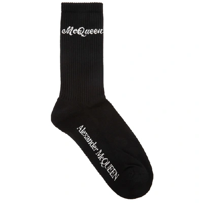 Shop Alexander Mcqueen Black Logo-intarsia Cotton-blend Socks In Black And White