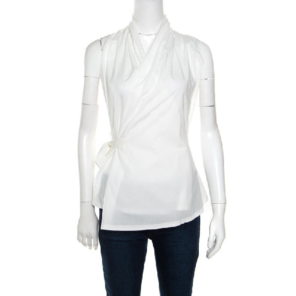 white sleeveless wrap top