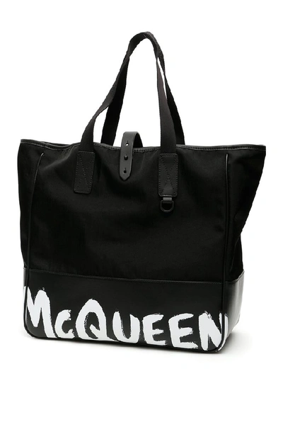 Shop Alexander Mcqueen Graffiti Logo Printed Tote Bag In Black