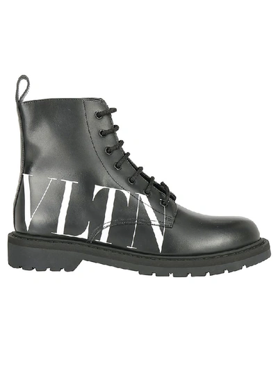 Shop Valentino Vltn High Top Boots In Black
