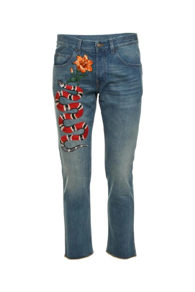 Shop Gucci Snake Embroidered Jeans In Blue