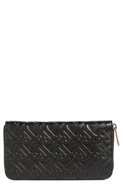 Shop Burberry Large Monogram Leather Wallet - Black