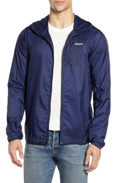 Shop Patagonia Houdini Water Repellent Hooded Jacket In Classic Navy
