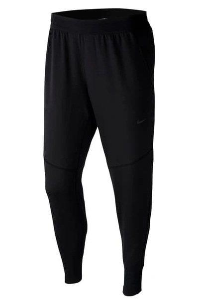 Shop Nike Dry Hyperdry Pocket Yoga Pants In Black