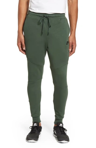 Shop Nike Tech Fleece Jogger Pants In Galactic Jade