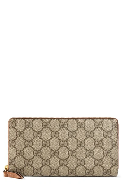 Shop Gucci Gg Supreme Zip Around Canvas Wallet In Beige/ebony/cuir
