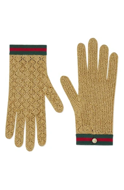 Shop Gucci Metallic Pointelle Knit Gloves In Oro/ Crystal
