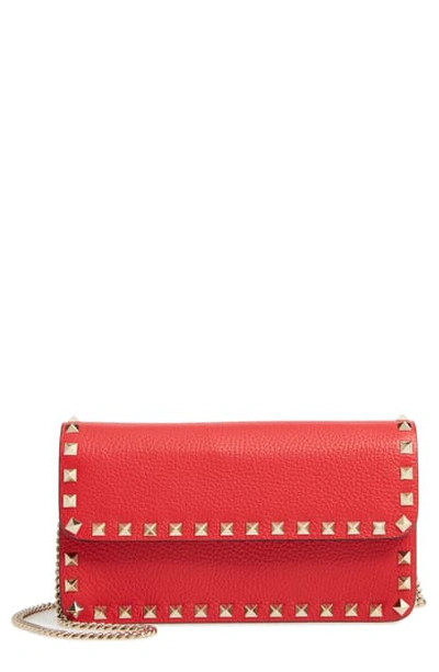 Shop Valentino Rockstud Leather Wallet On A Chain In Rouge Pur