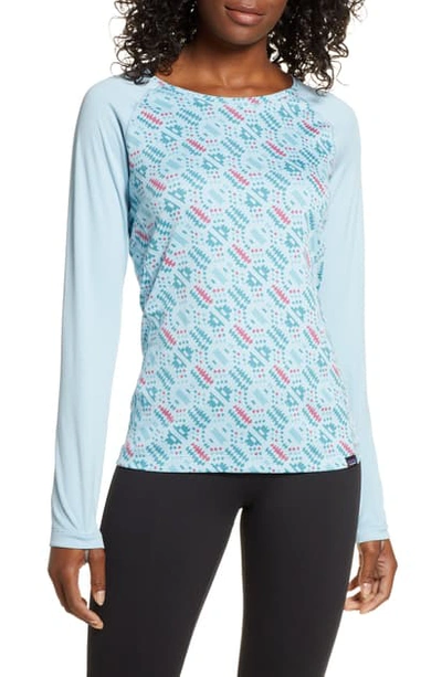 Shop Patagonia Paragonia Capilene Midweight Crewneck Top In Ilbb Icefall Big Sky Blue
