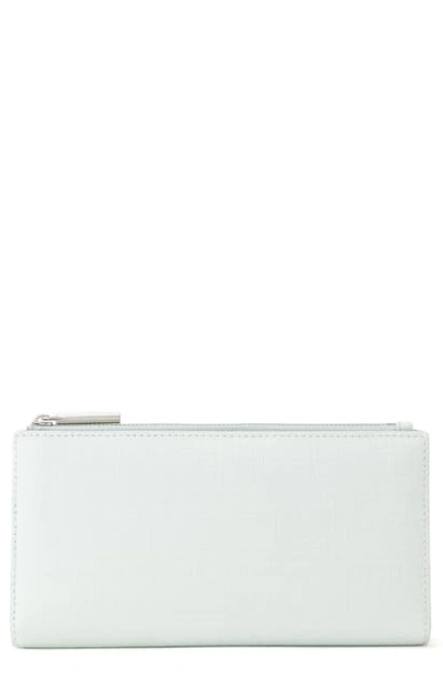 Shop Dagne Dover Signature Slim Coated Canvas Wallet - Blue In Moon Mist