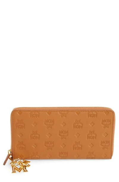 Shop Mcm Klara Leather Zip Wallet In Cognac