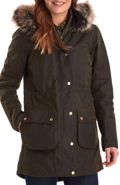 Shop Barbour Thrunton Waxed Cotton Jacket With Faux Fur Trim In Olive/ Classic