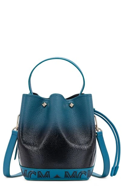 Shop Mcm Milano Logo Gradient Patent Goatskin Leather Bucket Bag In Black/ Lagoon