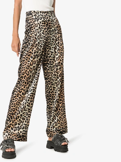 Shop Ganni Silk Leopard Print Trousers In Black