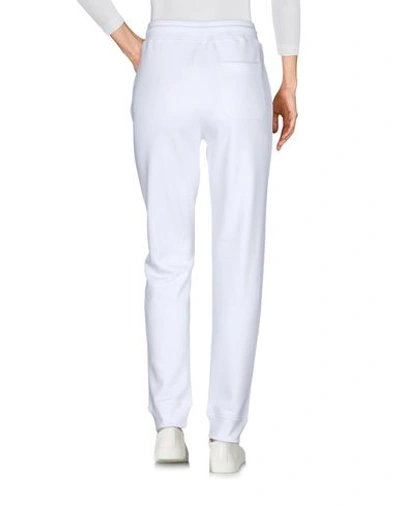 Shop Moschino Casual Pants In White