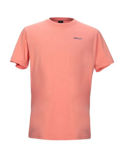 Shop Oakley T-shirt In Coral