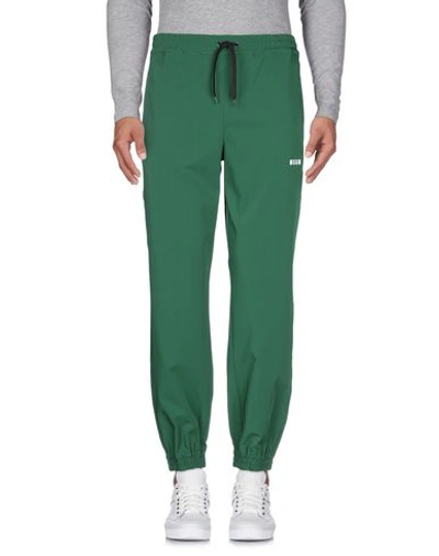 Shop Msgm Casual Pants In Green