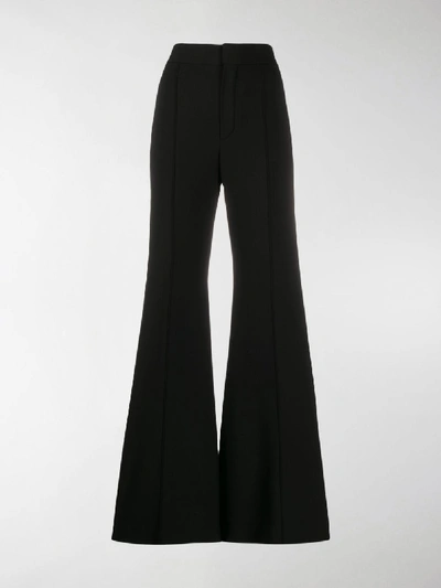 Shop Chloé High-rise Flared Trousers In Black