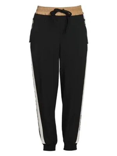 Shop Moncler Side Stripe Joggers In Black