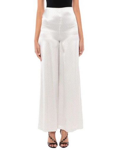 Shop Ganni Casual Pants In Ivory