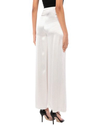 Shop Ganni Casual Pants In Ivory