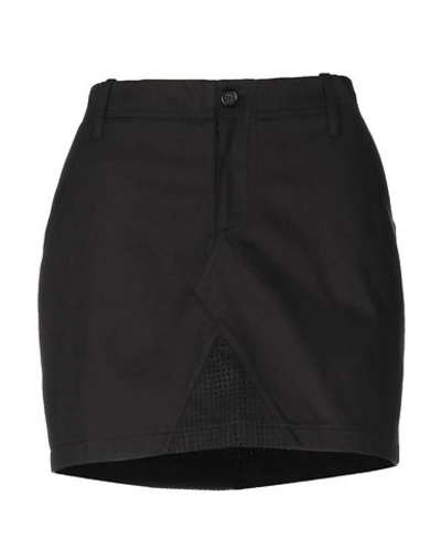 Shop Les Benjamins Mini Skirts In Black