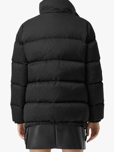 Shop Burberry Monogram Puffer Jacket In Black