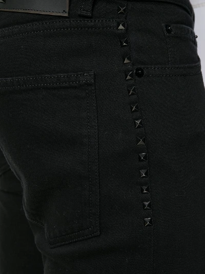 Shop Valentino Rockstud Slim-fit Jeans In Black