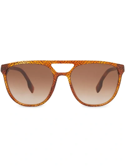 Shop Burberry Navigator-frame Sunglasses In Brown